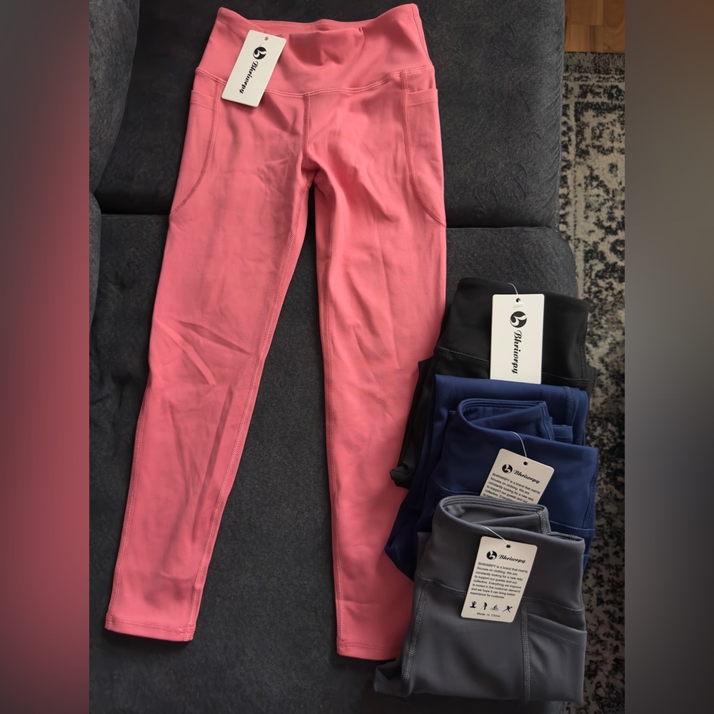 Leggings in pink, navy, gray, and black